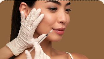 Gloved clinician's hand holding a small syringe near a relaxed patient's upper face, tasteful, no blood